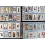 Cigarette cards, approx 3000 cards contained in 4 modern albums, various manufacturers and series,