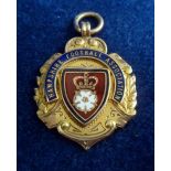 Football medal, Hampshire FA, gold and enamel medal (12g) presented for the Intermediate Cup 1926/27