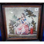 Collectables, an embroidered picture of a young lady in pastoral dress seated on a garden bench