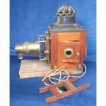 Magic Lantern. A mahogany and brass J.H. Steward (406 The Strand London) Magic Lantern wired for