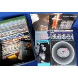 Vinyl records, a mixed selection of LP's/12" singles (40+) & 45rpm records (approx. 75), very
