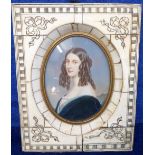 Portrait Miniature. Bone/ivory framed portrait miniature of a beautiful lady with long dark ringlets