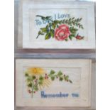 Postcards, an album containing a mixed selection of cards inc.12 WWI sentimental silks, hand painted