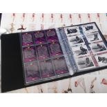 Glamour, an album of Varga illustrated glamour cards from various series, sold with a rolled, uncut,