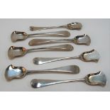 Set of seven white metal scoop shaped teaspoons, indistinctly stamped twice, weight 67.1g approx.