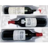 Three 750ml bottles of vintage Chateau Fonpiqueyre Haut-Medoc wine, 1970 & two 1990