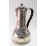 George II silver baluster dome lidded jug with possibly later leather covered handle, engraved