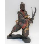Japanese gilt painted and patinated bronze model of a Samurai with two swords, the back signed