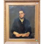 EARLY 20TH CENTURY BRITISH SCHOOL Half length portrait of a seated lady in black dress Oil on canvas
