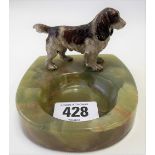 Austrian cold painted bronze spaniel applied to a green onyx ashtray, length of dog 8cm.