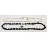 Modern pearl bead necklace with 9ct gold clasp stamped 375 together with a pair of matching