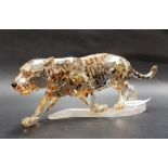 Swarovski glass leopard with gilt lustre spots, width 17cm, box.