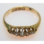 18ct gold diamond set five stone ring, the central diamond of 0.05ct spread approx, Birmingham 1911,