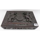 Late 19th Century Chinese carved hardwood rectangular hinge lidded box, the lid carved with two deep