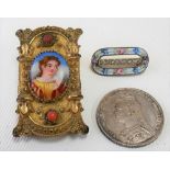 19th Century pinchbeck brooch/pendant with oval porcelain painted portrait panel & coral inset;
