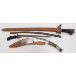 Kukris with horn handle, a Kris dagger with carved handle, an Eastern sword and a slender, thin