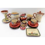 Watcombe Torquay pottery teaset for two; together with five Torquay motto souvenir wares.