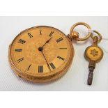 19th Century 18k gold ladies fob key wind pocket watch with foliate scroll engraved case & with gilt