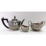 Victorian silver oval section half fluted teapot & sucrier by Goldsmiths & Silversmiths Company,