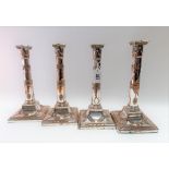 Set of four George III Old Sheffield plated candlesticks, possibly by Thomas Law, of Neo-Classical