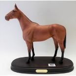 Beswick pottery connoisseur model of the horse Arkle upon oval wooden base, height 30.5cm.