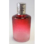 Good Edwardian cranberry blush glass silver foliate engraved lid scent bottle, the hinged lid over a