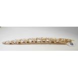 Early 20th Century African ivory carved and pierced elephant bridge tusk, length 40cm (af).