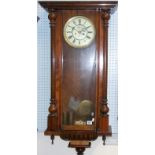 Gustav Becker walnut case two-train Vienna wall clock, with 7 inch cream enamel dial with Roman
