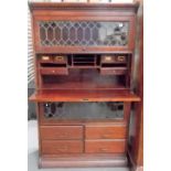 Early 20th Century mahogany sectional secretaire bookcase with two leaded glazed compartments, a