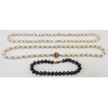 Two 9ct gold pearl & gold bead necklaces together with a black pearl bracelet with 9ct gold clasp (