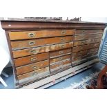 Early 20th Century stained pine architect's draughtsman's plan chest, the hinged top over six long