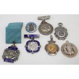 Seven various silver and silver and enamel medals, mostly music and drama-related, weight 2.20oz