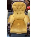Victorian mahogany frame salon armchair with button upholstered back & upholstered arms & seat
