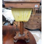 Victorian rosewood veneered work table, the hinged top revealing a lidded recess & yellow silk