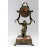 French bronzed spelter timepiece, the 2' silvered dial with French movement within drum case being
