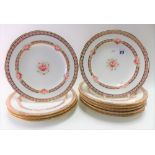 Set of 10 Minton plates painted with pink rose reserves within gilt bands, impressed mark and date