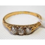 18ct gold diamond set three-stone ring, each stone of 0.10ct spread approx, weight 2.5g approx.