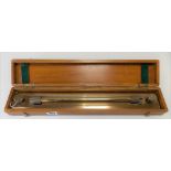 Boxed brass rolling rule by E.W.W. Birmingham within fitted pine hinged box, length 45cm.