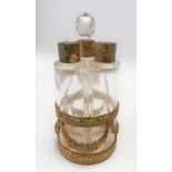 Gilt metal mounted triple bottle scent casket, the sides foliate swag cast & pierced, height 12.