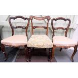 Pair of Victorian rosewood balloon back dining chairs with stuff-over upholstered seats & on