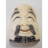 Japanese Meiji period small ivory mask carved & pierced with the face of gentleman, signed to the