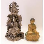 Interesting Chinese silvered metal Buddhistic group cast as Guanyin sitting cross-legged on a