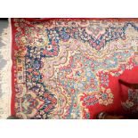 European hand-knotted carpet with large foliate medallion surrounded by floral sprays & floral