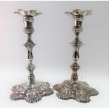 Good pair of George II silver candlesticks by John Cafe, of Rococo cast design with detachable