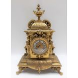 19th Century French Ormolu two train mantle clock, the architectural case with foliate scrolls and