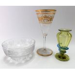 Cut and fluted glass gilt decorated comical wine glass with star cut foot, height 20cm; together