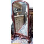 Victorian style mahogany cheval mirror, the dome top rectangular plate upon S-shaped supports united