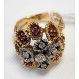 Interesting 18ct textured gold diamond & ruby cluster ring, the stones set in a flower head the