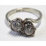 Platinum two stone diamond set ring, each diamond of 0.50ct spread approx, weight 3.8g approx. (