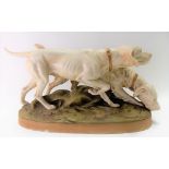 Royal Dux large porcelain group depicting two hunting dogs upon a naturalistic oval base, pink pad